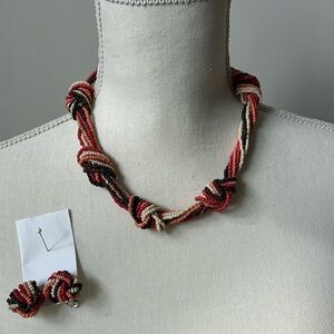 Brown, orange, coral, and white necklace with matching clip earrings
